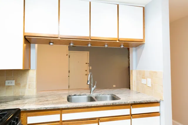 a view of a sink and a mirror