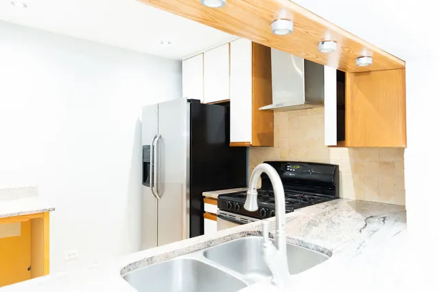 a bathroom with a sink and a bathtub