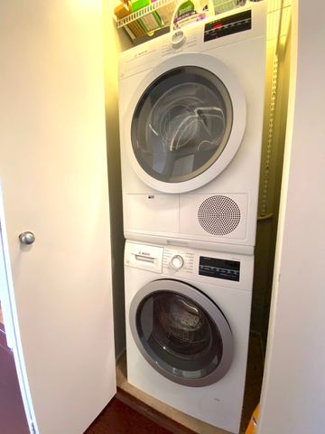 a front view of a building with outdoor space