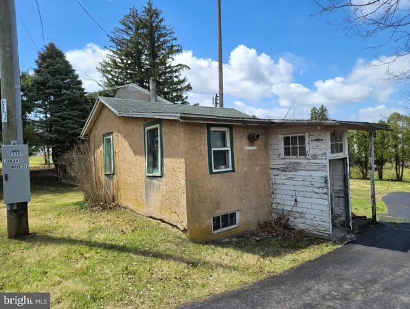 a view of a house with a swimming pool