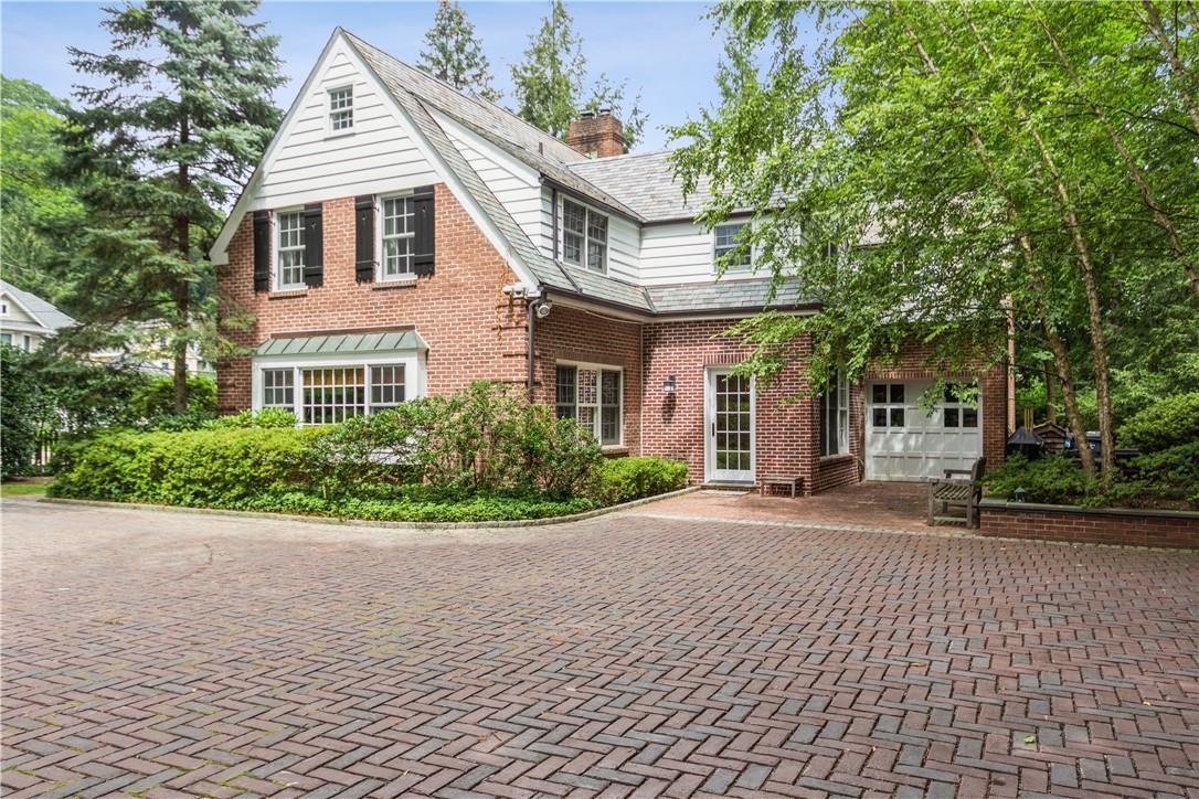 72 Valley Road Katonah, NY 10536 - Photo 1 of 1 a front view of a house with a garden