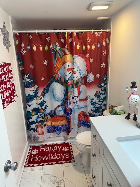 3341 West 184th Street, Unit 1B Homewood, IL 60430 - Photo 14 of 32 a bathroom with a toilet sink and mirror