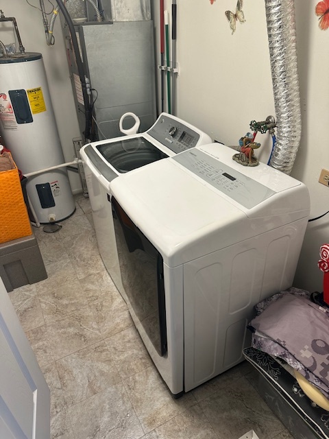 3341 West 184th Street, Unit 1B Homewood, IL 60430 - Photo 27 of 32 a utility room with dryer and washer