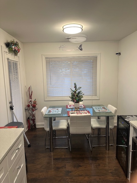 3341 West 184th Street, Unit 1B Homewood, IL 60430 - Photo 29 of 32 a view of a dining room with furniture and wooden floor