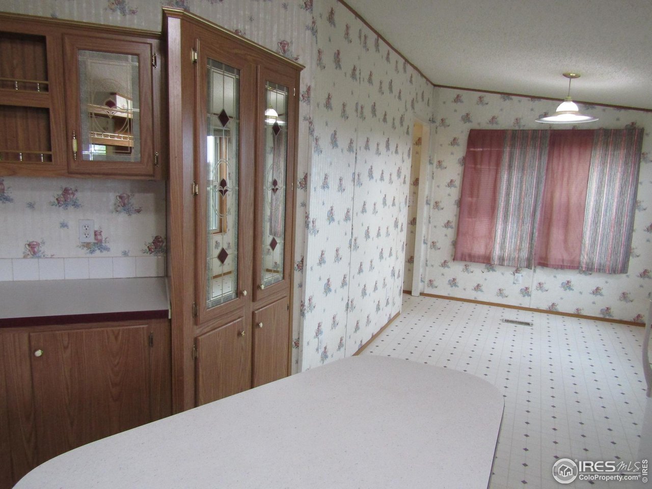 18500 Centennial Road Fort Morgan, CO 80701 - Photo 13 of 37 Kitchen pantry/island/eating area