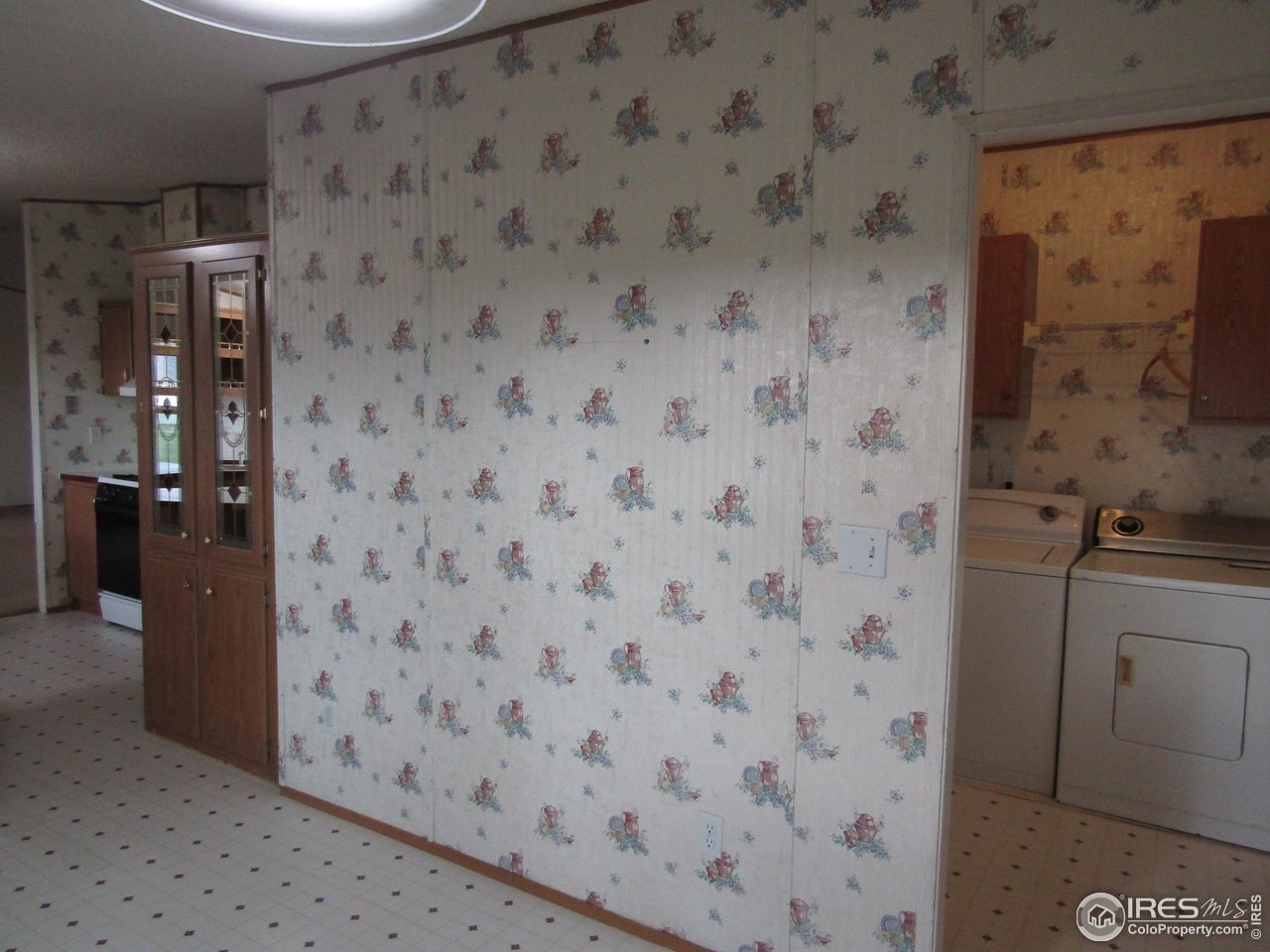18500 Centennial Road Fort Morgan, CO 80701 - Photo 16 of 37 Kitchen/laundry from eating area