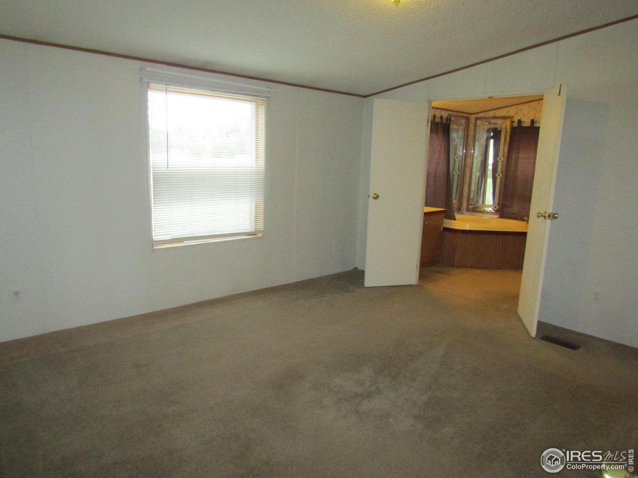 18500 Centennial Road Fort Morgan, CO 80701 - Photo 20 of 37 Primary bedroom/bathroom