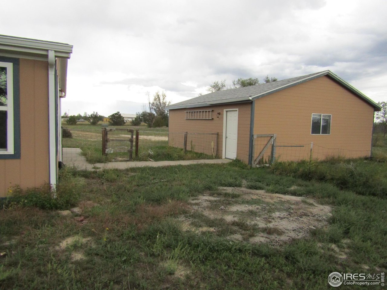 18500 Centennial Road Fort Morgan, CO 80701 - Photo 34 of 37 New walk thru door going into garage.
