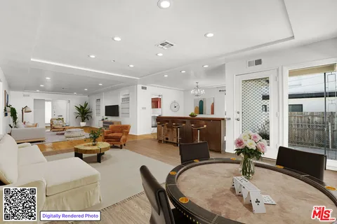 a living room with furniture large window and a flat screen tv