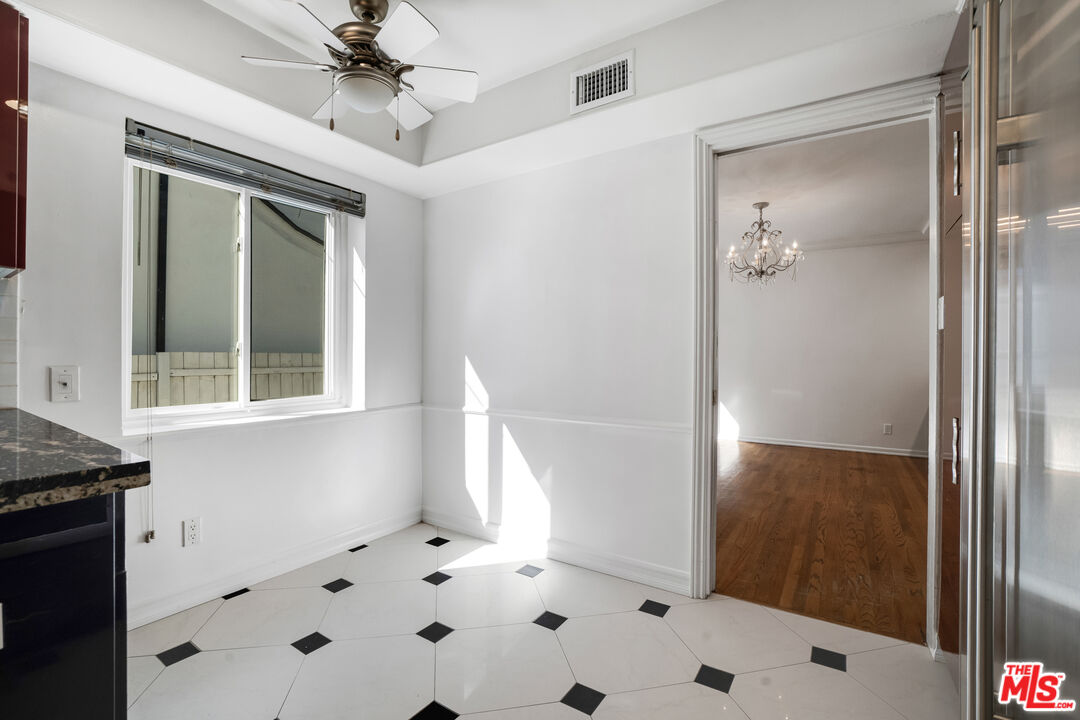 1617 Reeves Street Los Angeles, CA 90035 - Photo 22 of 55 a bathroom with a shower and a sink