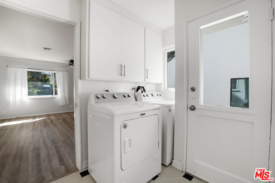 1617 Reeves Street Los Angeles, CA 90035 - Photo 24 of 55 a view of bathroom with a sink mirror and window