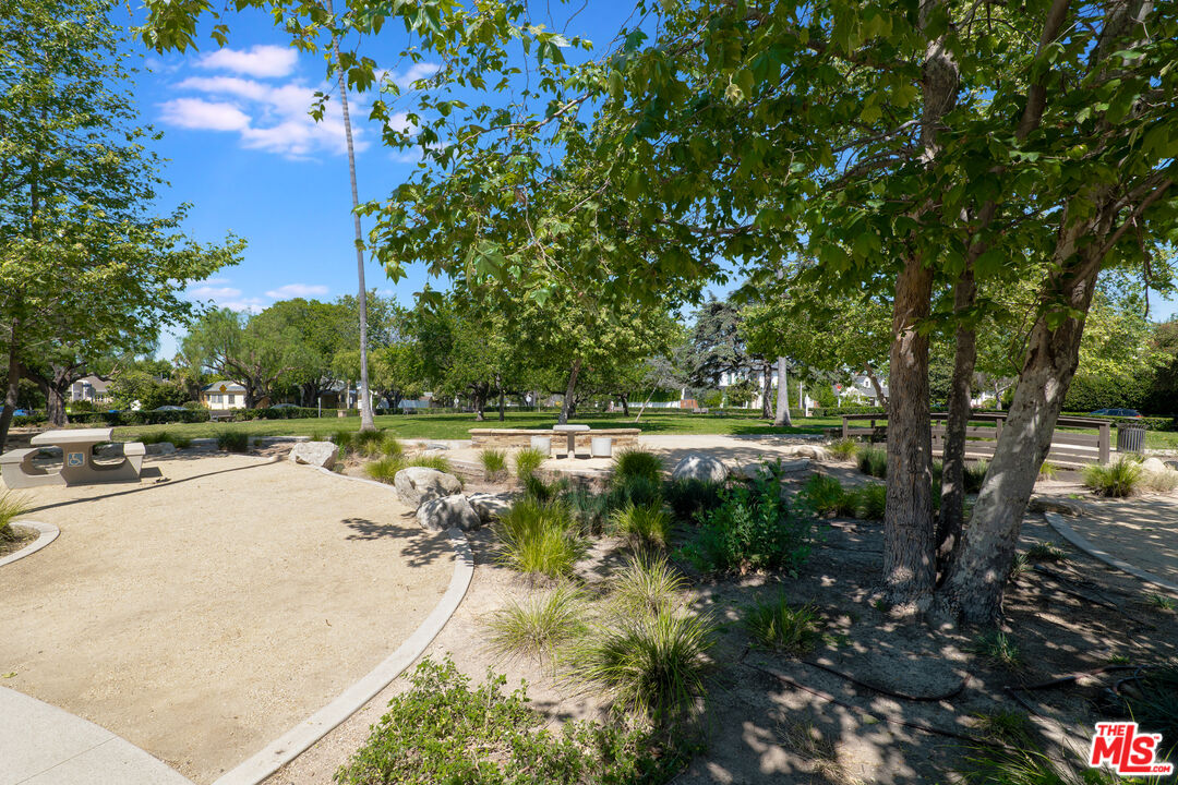 1617 Reeves Street Los Angeles, CA 90035 - Photo 53 of 55 a view of swimming pool and trees in the background