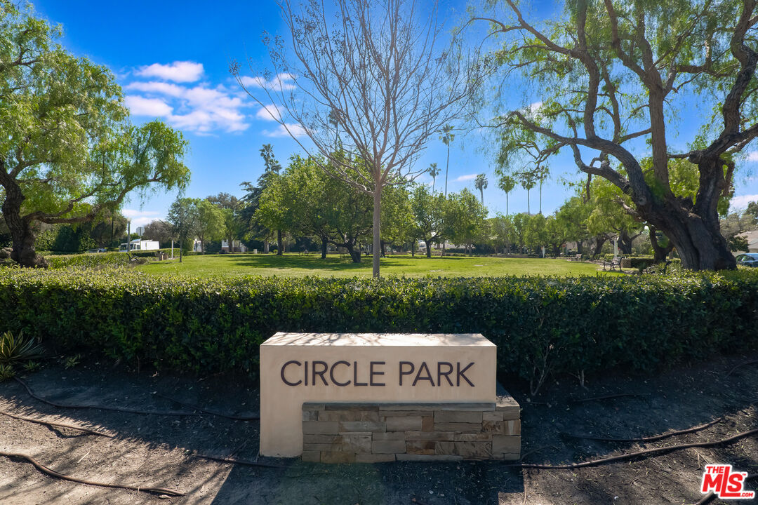 1617 Reeves Street Los Angeles, CA 90035 - Photo 55 of 55 a view of a park that has a fountain and a large tree