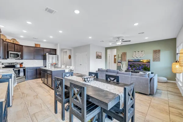 a view of a dining room with furniture