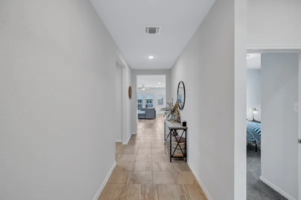 a view of a hallway with a furniture