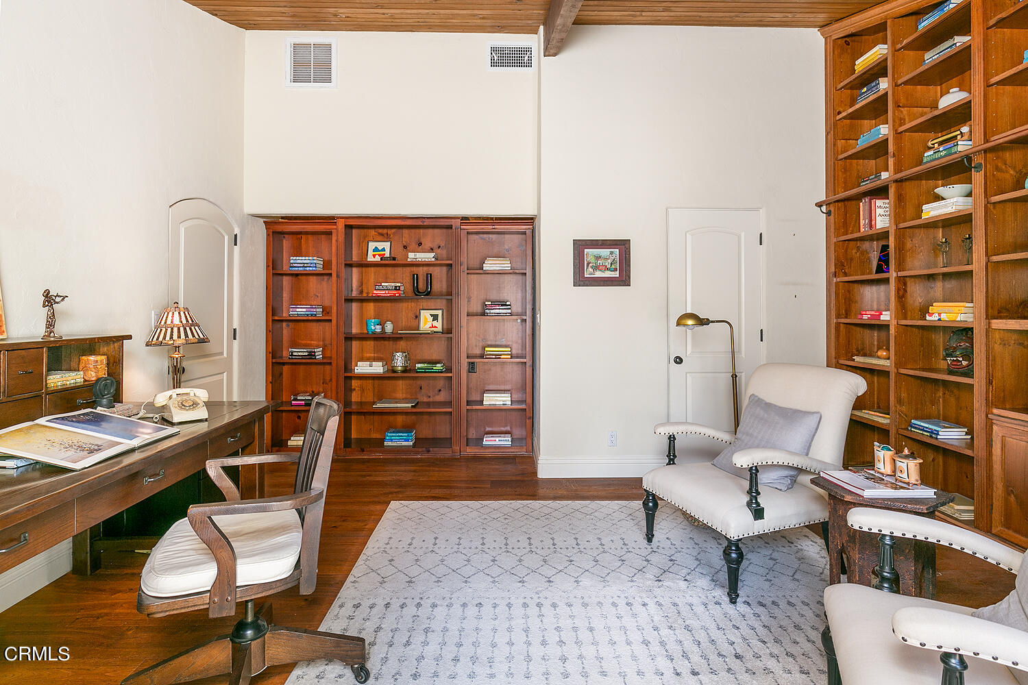 625 Burleigh Drive Pasadena, CA 91105 - Photo 14 of 43 a living room with furniture a rug and a table