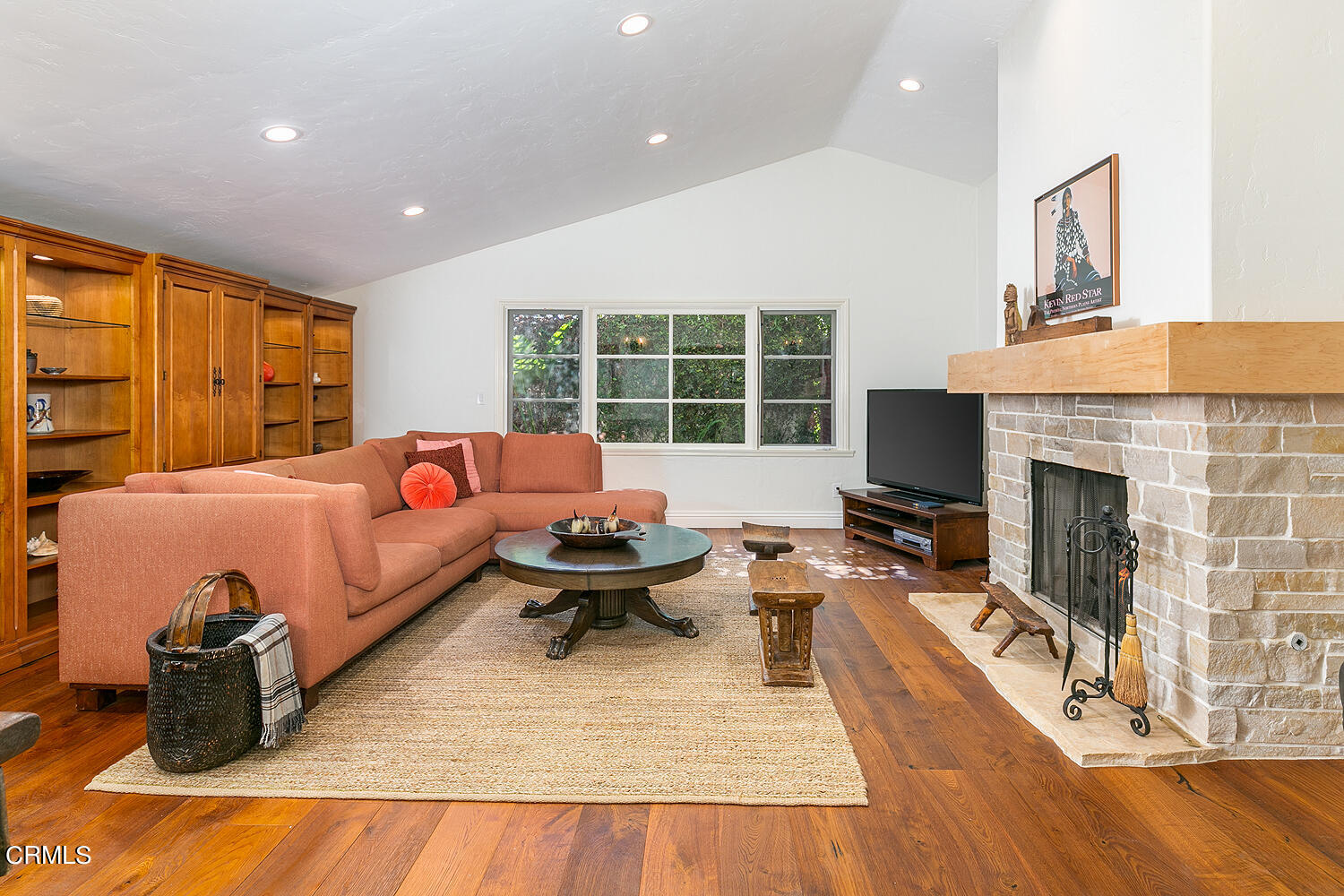 625 Burleigh Drive Pasadena, CA 91105 - Photo 15 of 43 a living room with furniture and a fireplace