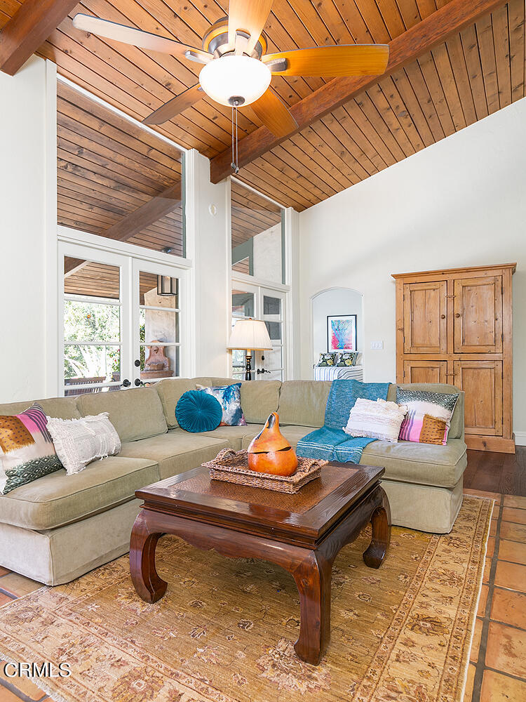 625 Burleigh Drive Pasadena, CA 91105 - Photo 22 of 43 a living room with furniture and a table