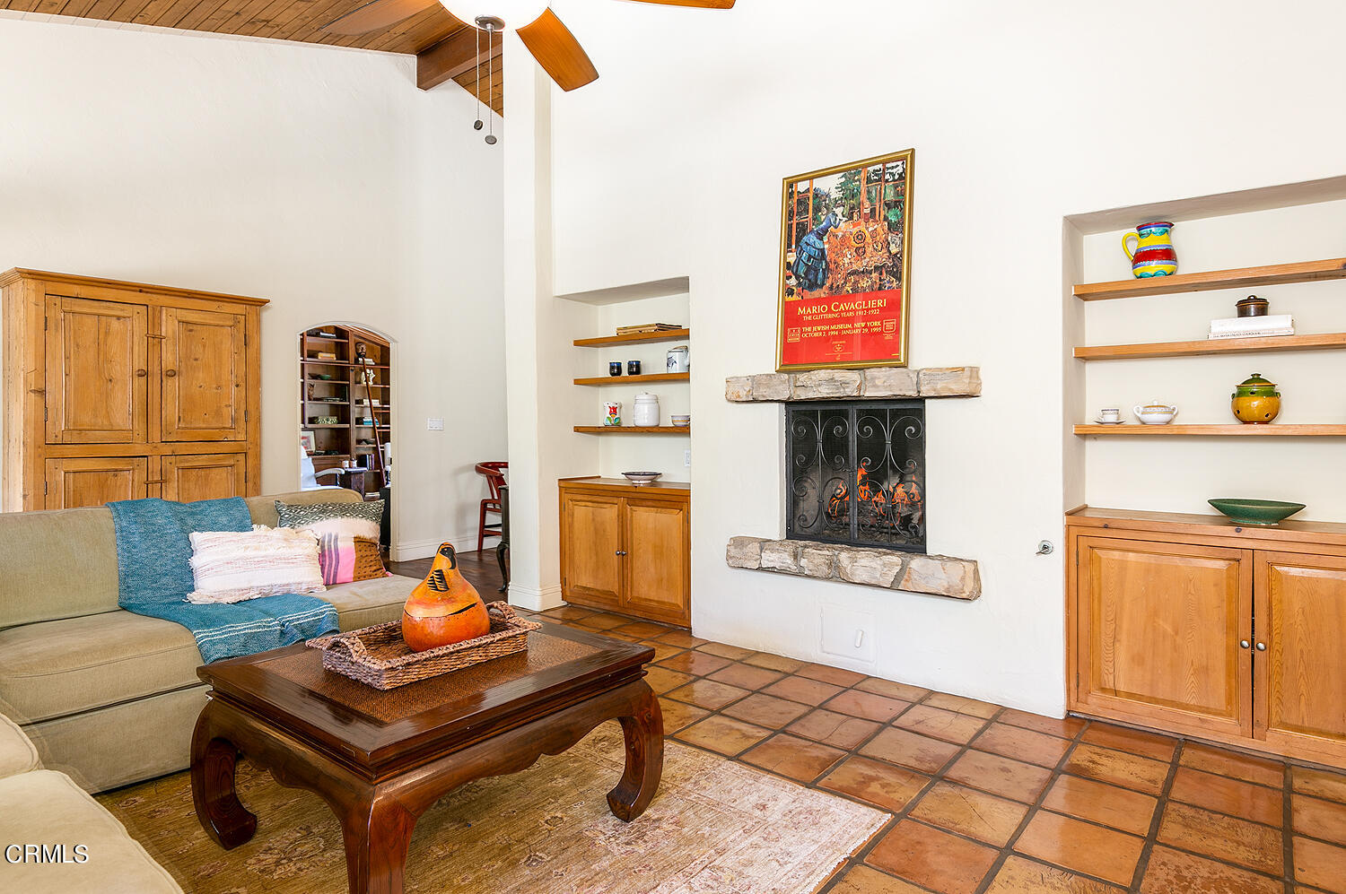 625 Burleigh Drive Pasadena, CA 91105 - Photo 23 of 43 a living room with furniture a rug and a fireplace