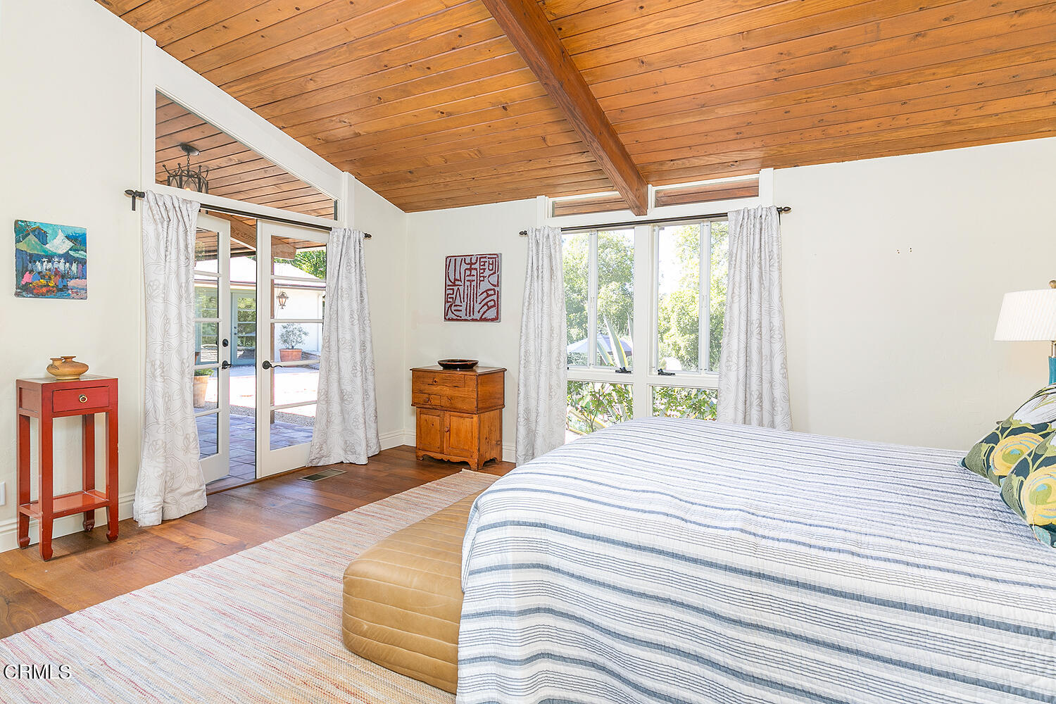 625 Burleigh Drive Pasadena, CA 91105 - Photo 25 of 43 a bedroom with a bed and wooden floor
