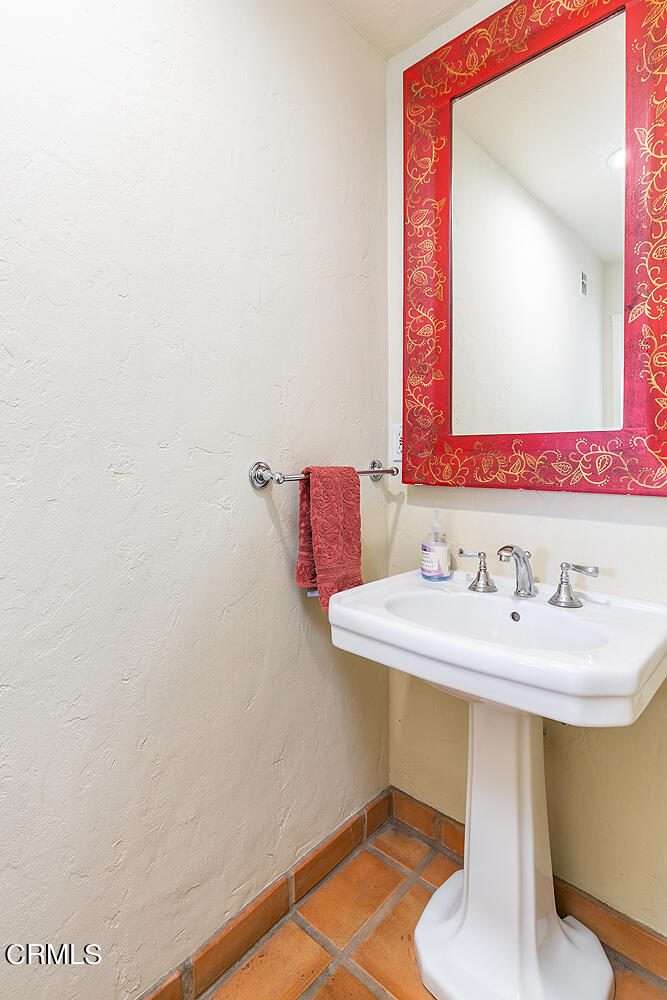 625 Burleigh Drive Pasadena, CA 91105 - Photo 28 of 43 a bathroom with a sink and a mirror