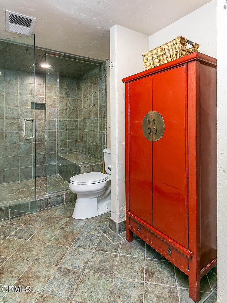 625 Burleigh Drive Pasadena, CA 91105 - Photo 34 of 43 a bathroom with a toilet and a shower