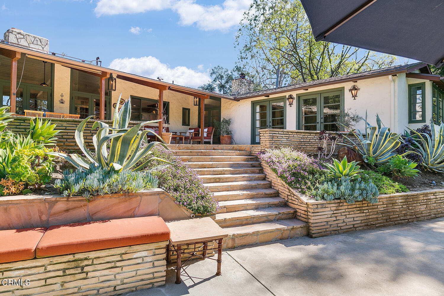 625 Burleigh Drive Pasadena, CA 91105 - Photo 40 of 43 a front view of a house with garden