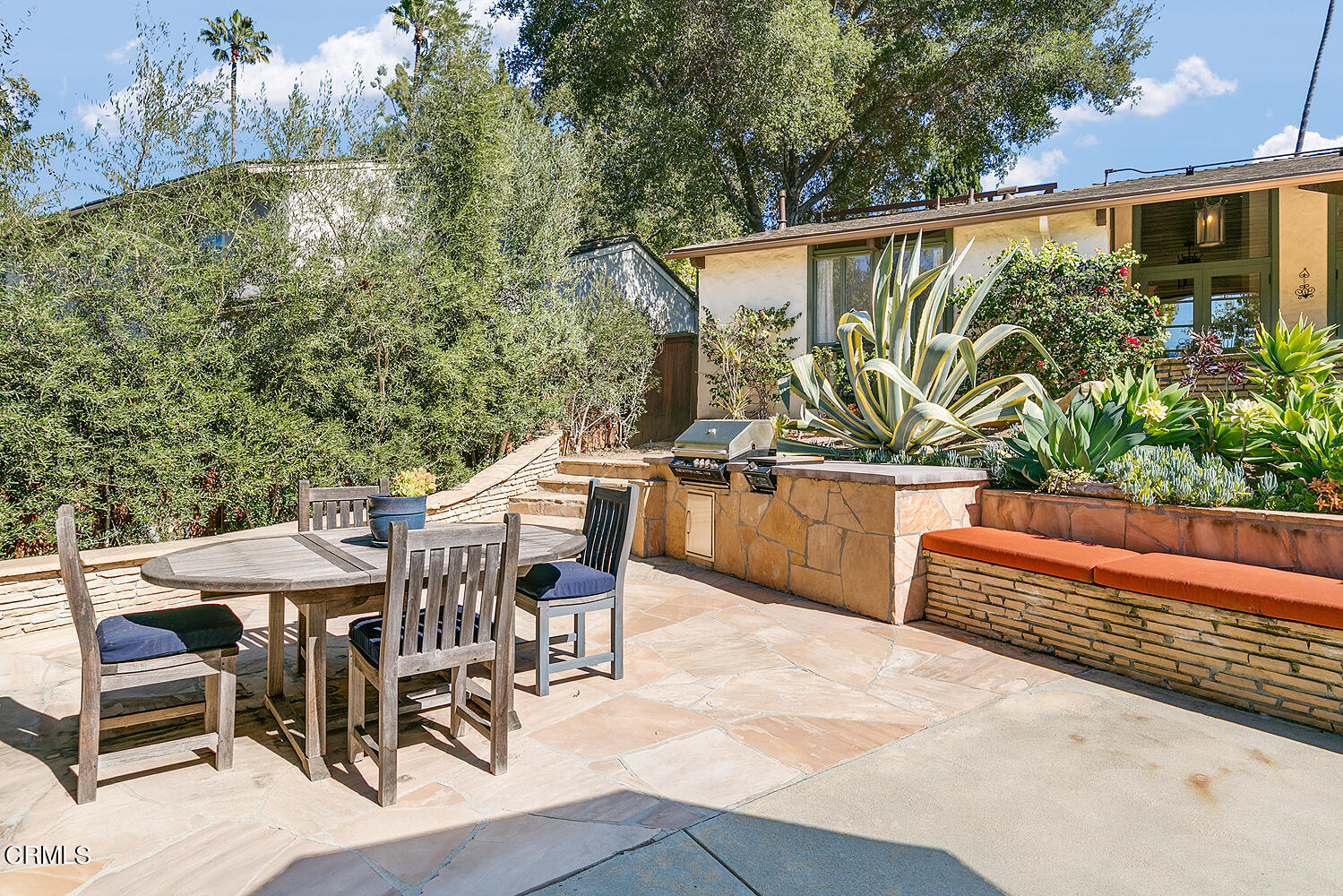 625 Burleigh Drive Pasadena, CA 91105 - Photo 41 of 43 a balcony with table and chairs