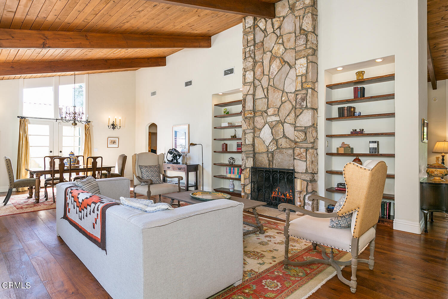 625 Burleigh Drive Pasadena, CA 91105 - Photo 7 of 43 a living room with furniture and a fireplace