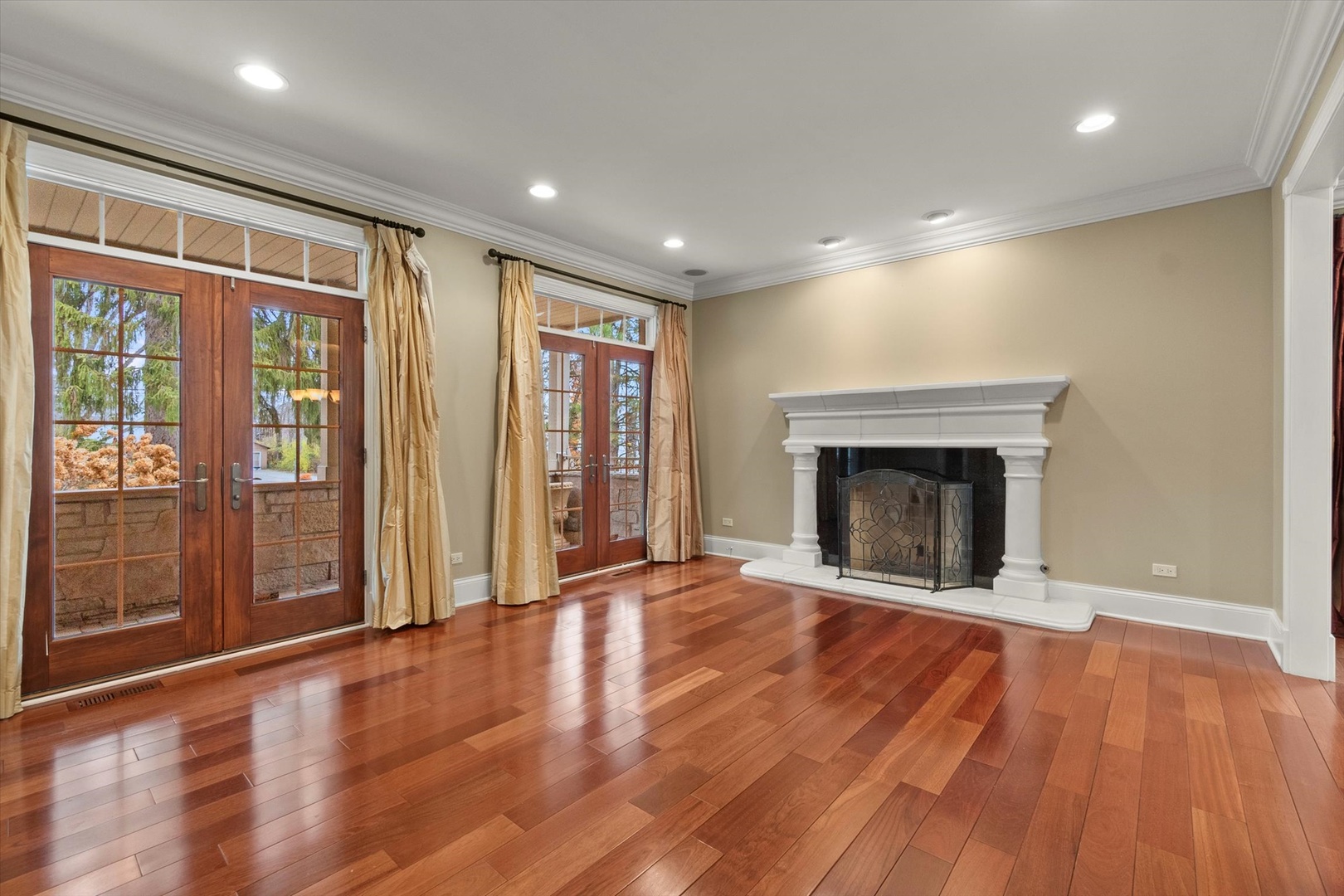 130 Fuller Road Hinsdale, IL 60521 - Photo 12 of 30 a view of an empty room with glass door and wooden floor