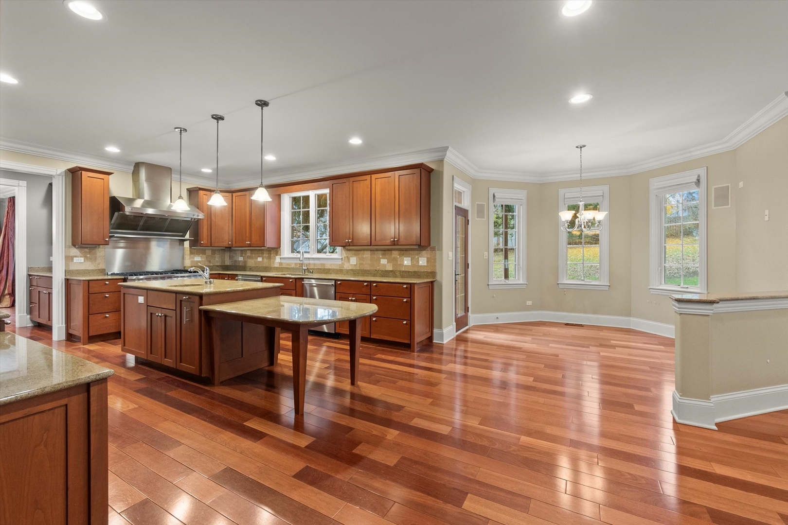 130 Fuller Road Hinsdale, IL 60521 - Photo 15 of 30 a kitchen with stainless steel appliances granite countertop a refrigerator a stove top oven and a sink with cabinets