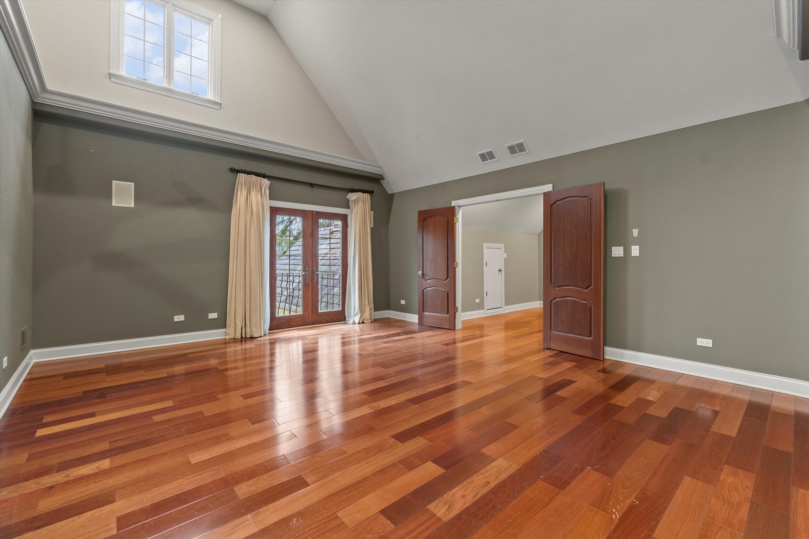 130 Fuller Road Hinsdale, IL 60521 - Photo 18 of 30 a view of an empty room with wooden floor and a window