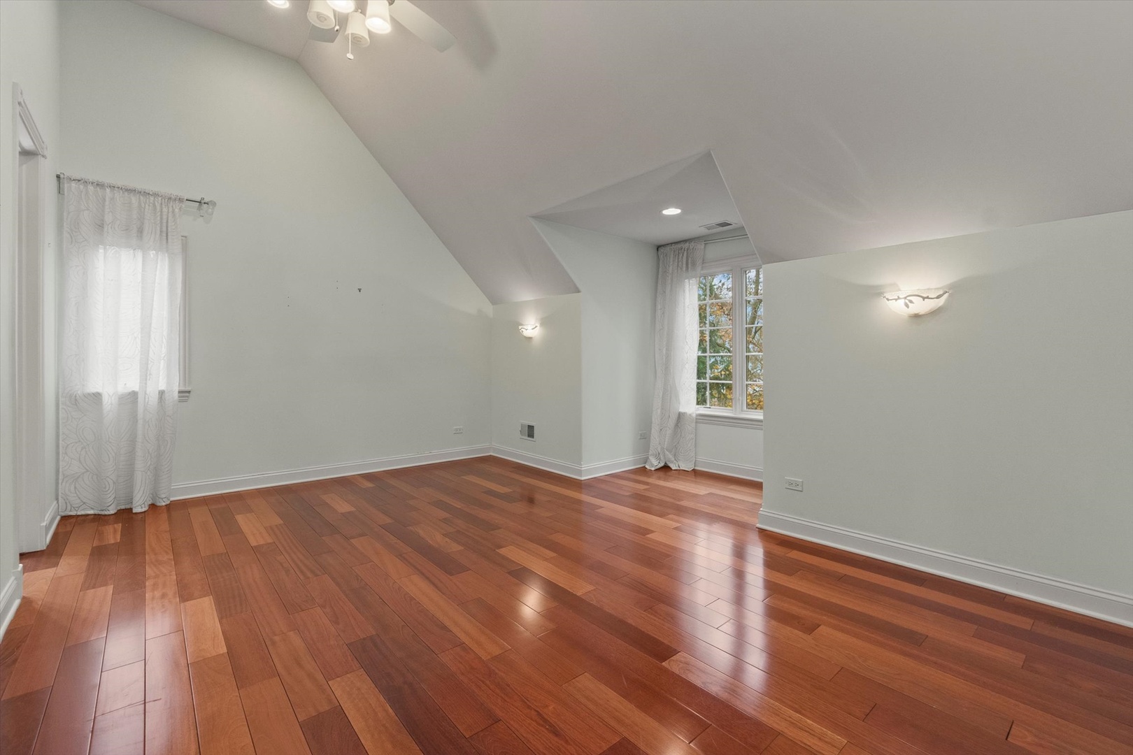 130 Fuller Road Hinsdale, IL 60521 - Photo 23 of 30 wooden floor in an empty room with a window