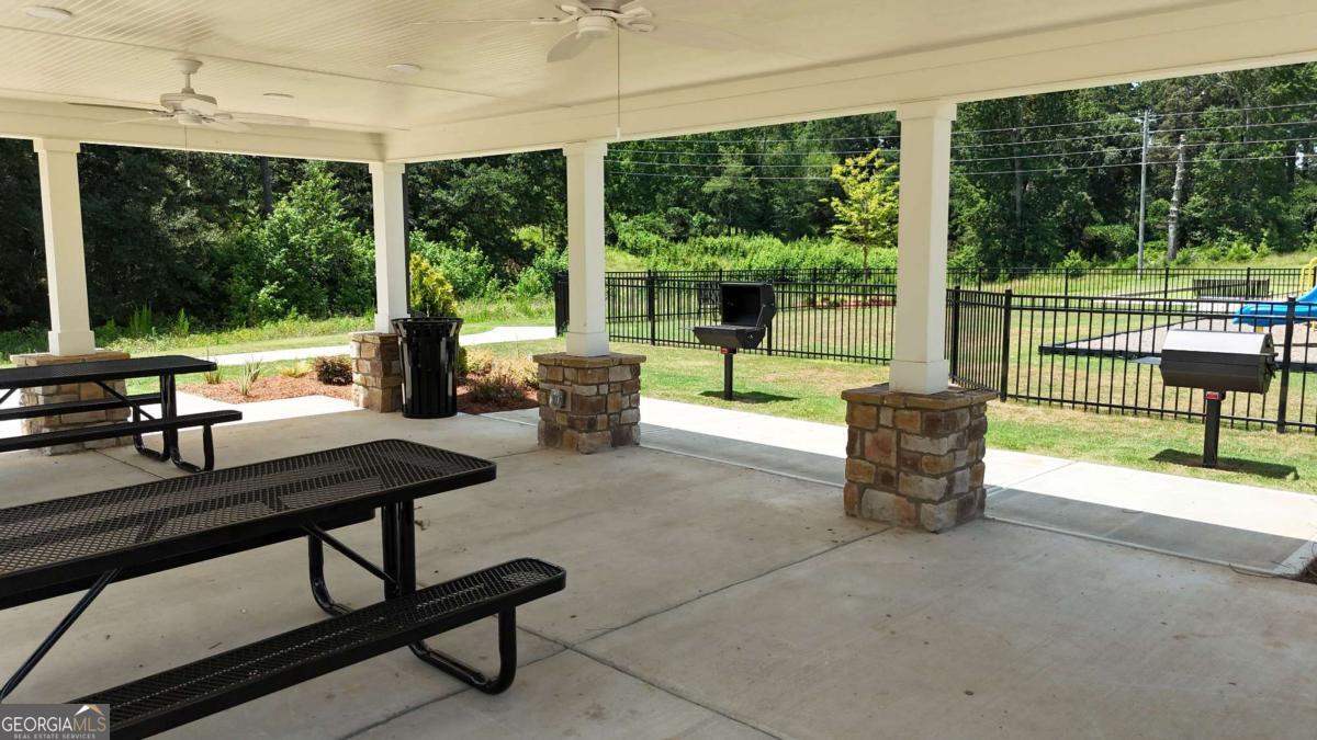 190 Otway Loop Winder, GA 30680 - Photo 13 of 17 a living room with furniture and a yard