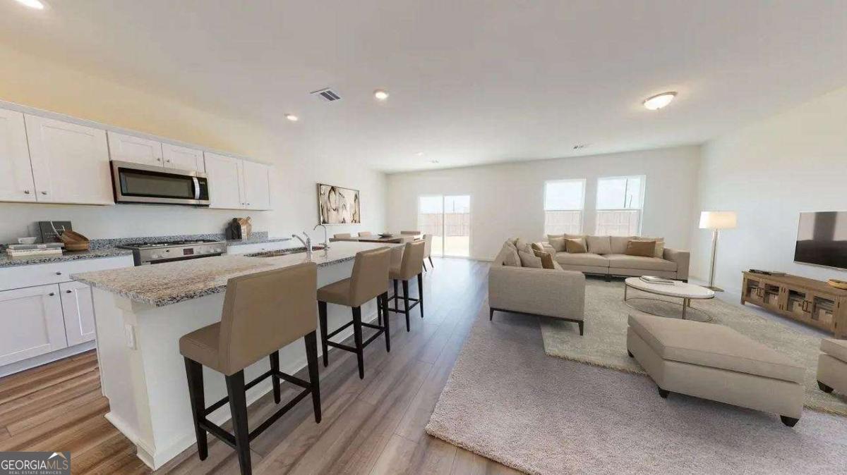 190 Otway Loop Winder, GA 30680 - Photo 3 of 17 a living room with furniture and a wooden floor