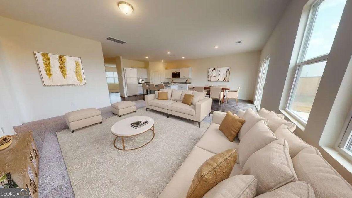 190 Otway Loop Winder, GA 30680 - Photo 6 of 17 a living room with furniture and a large window