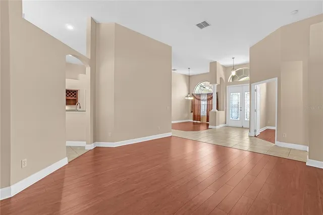 a kitchen with stainless steel appliances granite countertop a refrigerator stove a sink and dishwasher