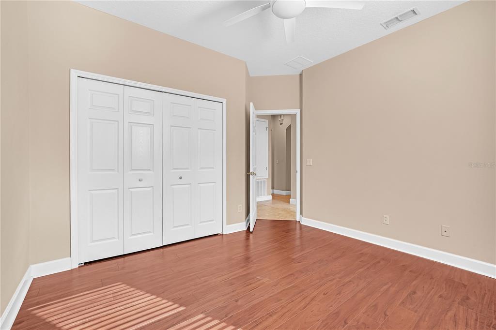 1542 Wescott Loop Winter Springs, FL 32708 - Photo 45 of 62 an empty room with wooden floor