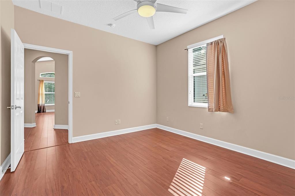 1542 Wescott Loop Winter Springs, FL 32708 - Photo 55 of 62 wooden floor in an empty room with a window