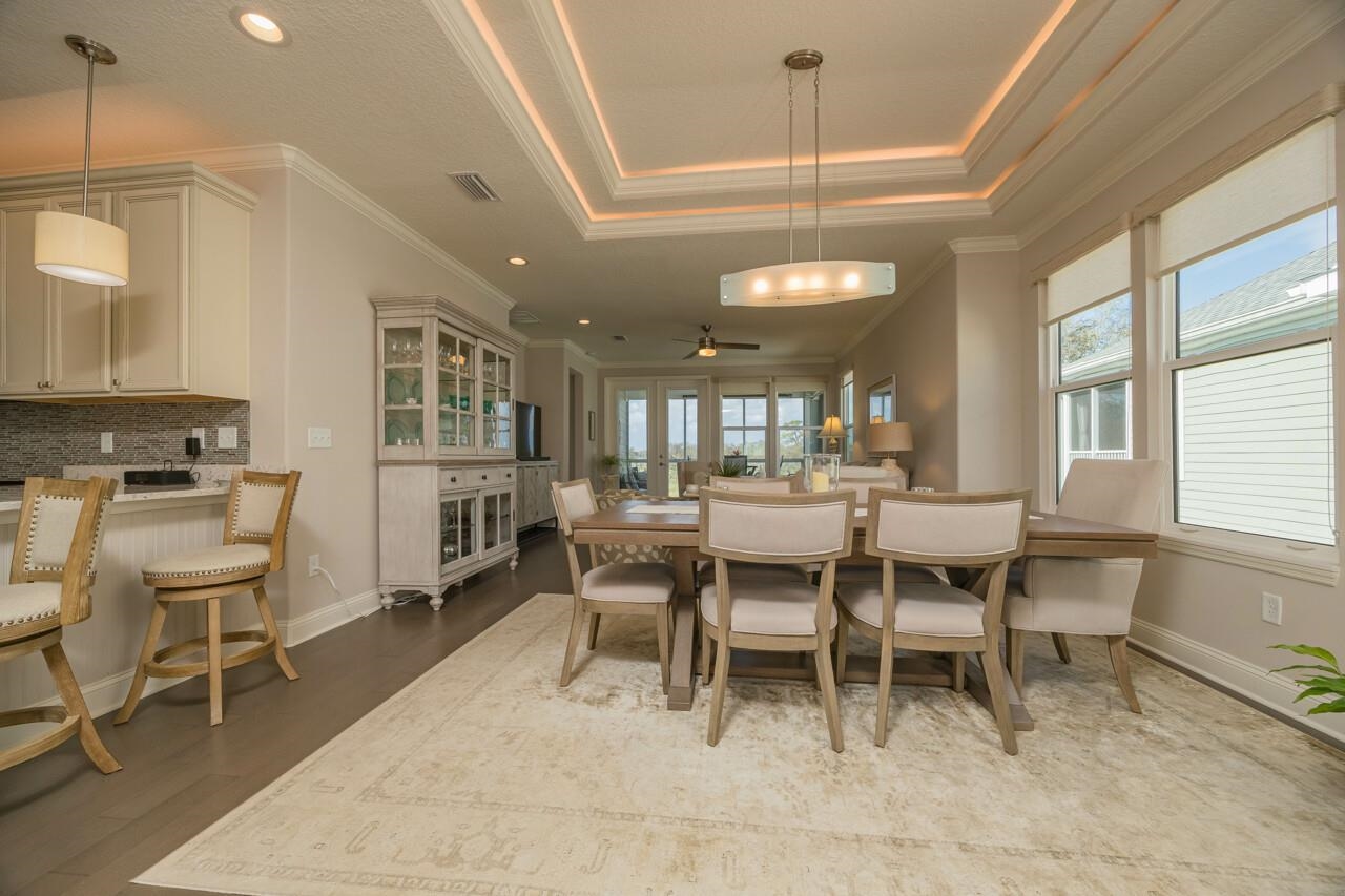 223 Sunset Point St. Augustine, FL 32080 - Photo 12 of 74 a dining room with furniture and window