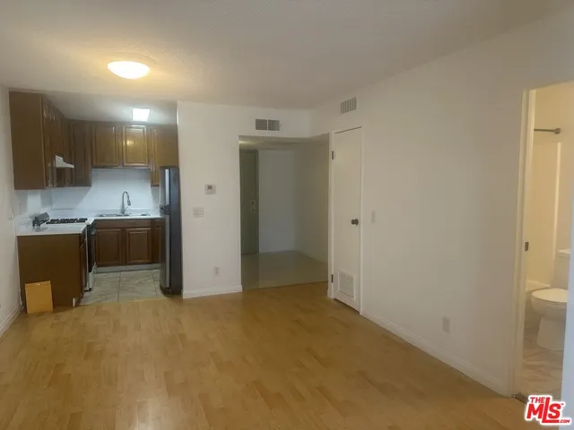 a view of a kitchen with a sink