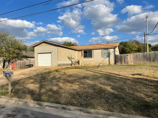 a view of a house with a big yard
