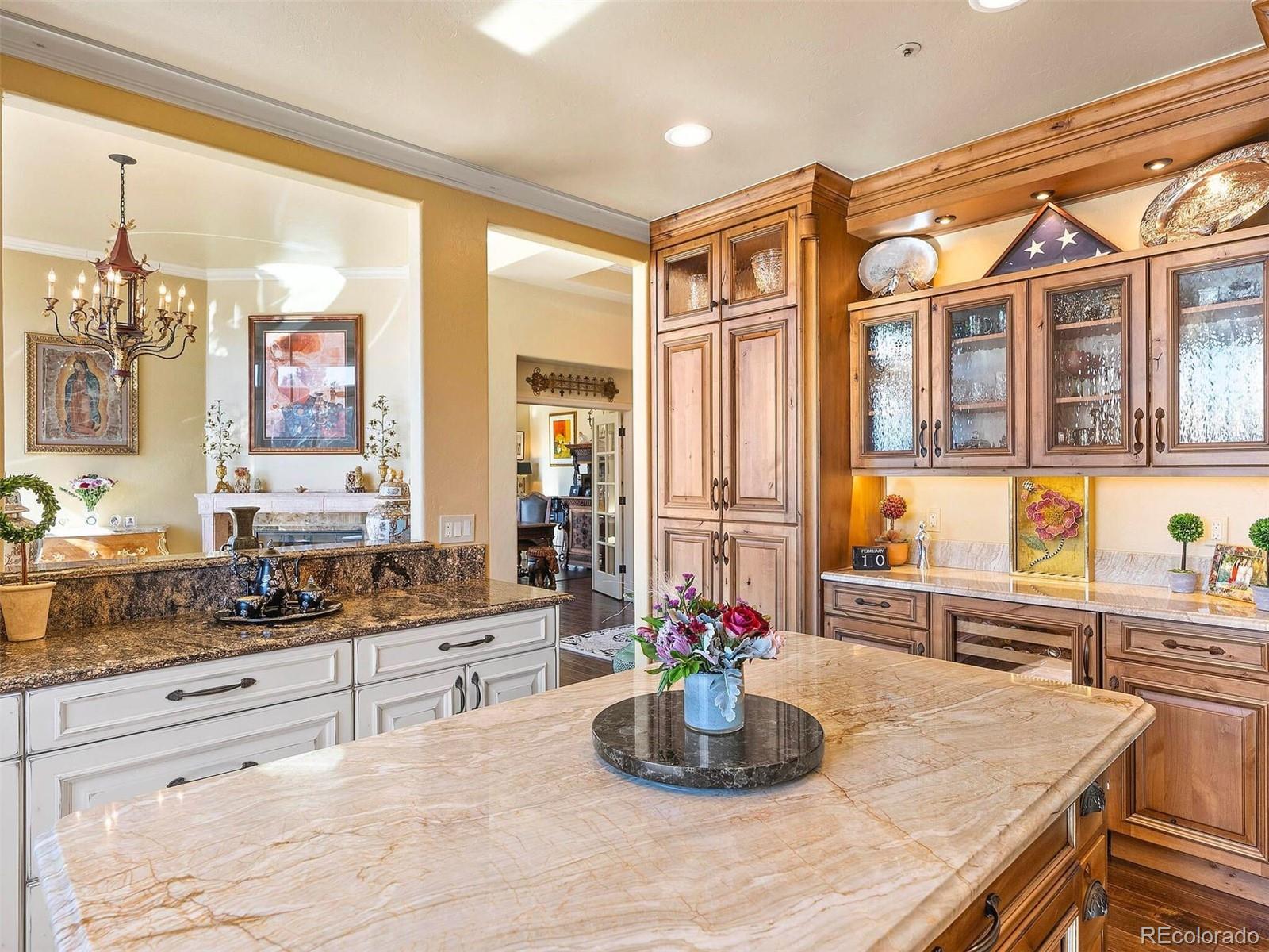 2124 Ridge Plaza Drive Castle Rock, CO 80108 - Photo 16 of 50 a kitchen with a stove a sink and cabinets