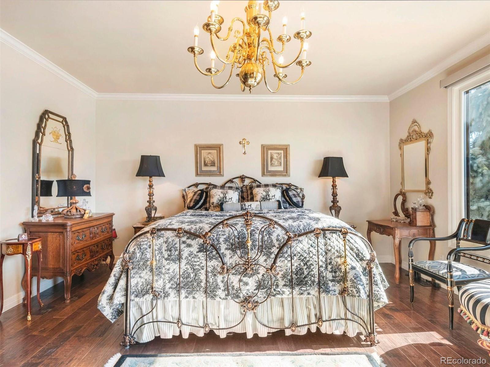 2124 Ridge Plaza Drive Castle Rock, CO 80108 - Photo 27 of 50 a bed room with a bed and a chair