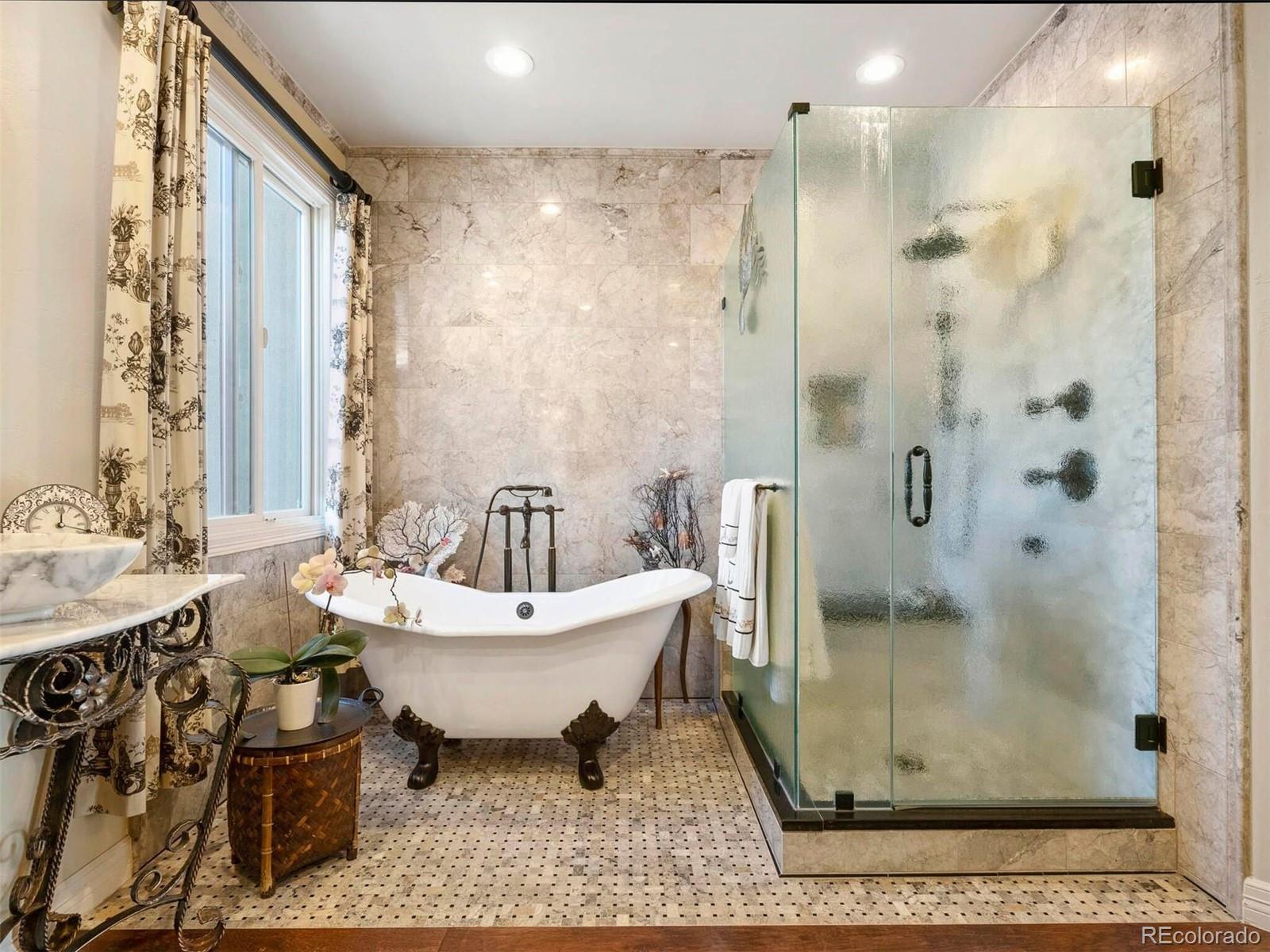 2124 Ridge Plaza Drive Castle Rock, CO 80108 - Photo 29 of 50 a bathroom with a sink toilet and shower