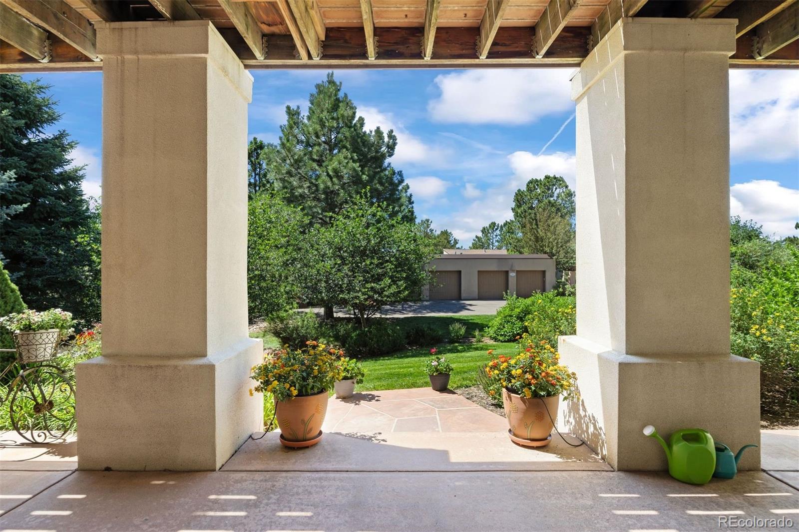 2124 Ridge Plaza Drive Castle Rock, CO 80108 - Photo 37 of 50 a view of a path along with potted plants
