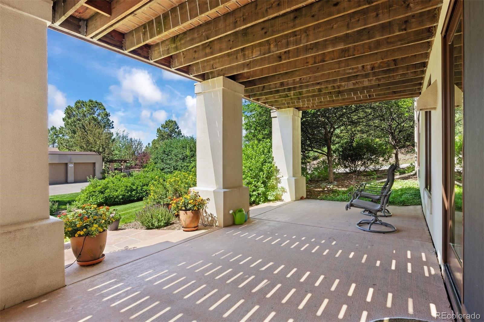 2124 Ridge Plaza Drive Castle Rock, CO 80108 - Photo 38 of 50 a front view of a house with garden