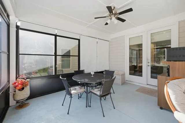 a front view of a house with a yard and porch
