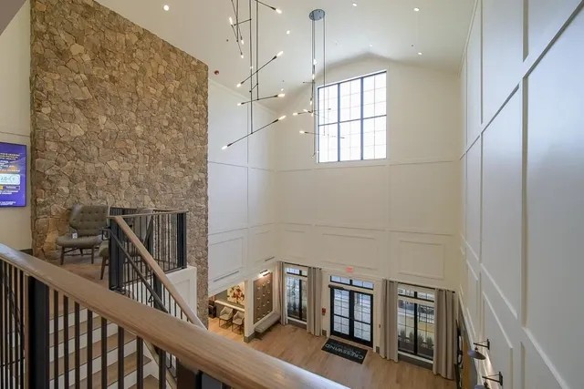 a kitchen with a table and chairs