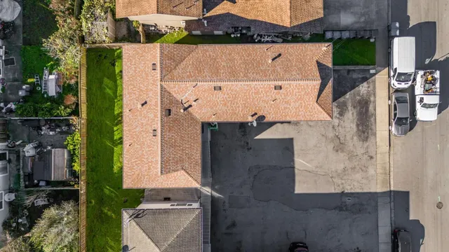 an aerial view of houses with outdoor space